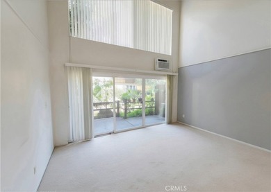 This top-floor end-unit townhome offers a spacious living room - photo 2