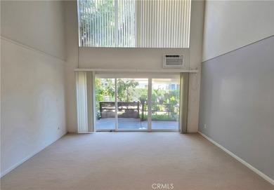 This top-floor end-unit townhome offers a spacious living room - photo 3