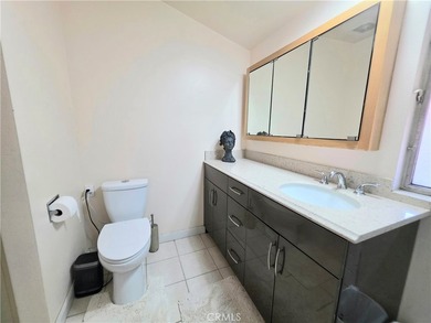 This top-floor end-unit townhome offers a spacious living room - photo 8