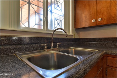 Welcome to this beautifully maintained 3-bedroom, 2-bathroom