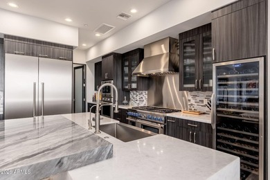 Welcome to this stunning estate located in the prestigious gated - photo 10