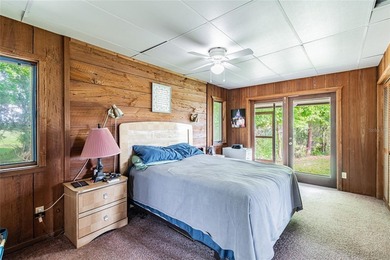 Set within 34+- acres of protected Florida ranchland, this - photo 40