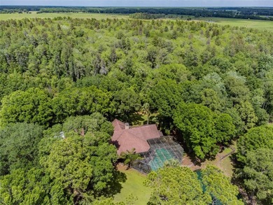 Set within 34+- acres of protected Florida ranchland, this - photo 45