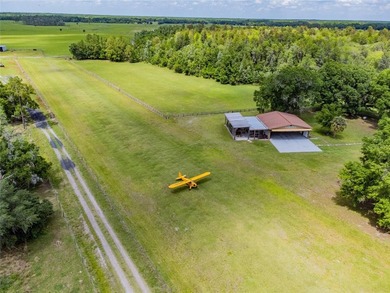 Set within 34+- acres of protected Florida ranchland, this - photo 46