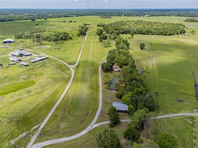 Set within 34+- acres of protected Florida ranchland, this - photo 47