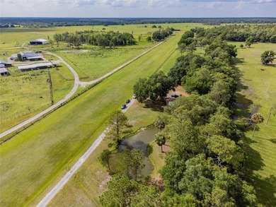 Set within 34+- acres of protected Florida ranchland, this - photo 48
