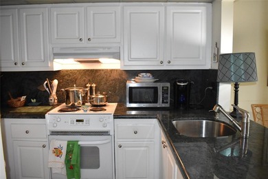WELL MAINTAINED 1 BEDROOM, 1 BATH CONDO WITH VIEW OF SOUTH CANAL - photo 6