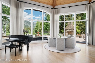 Nestled amid tranquil water features with sweeping views of the - photo 13