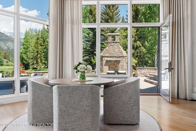 Nestled amid tranquil water features with sweeping views of the - photo 14