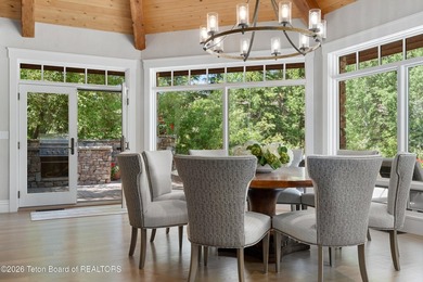 Nestled amid tranquil water features with sweeping views of the - photo 23