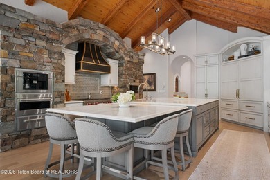 Nestled amid tranquil water features with sweeping views of the - photo 25