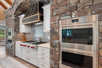 Nestled amid tranquil water features with sweeping views of the - photo 28