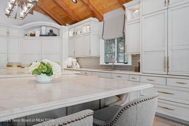 Nestled amid tranquil water features with sweeping views of the - photo 29