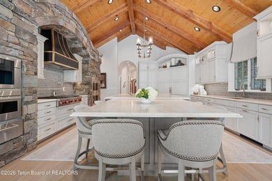 Nestled amid tranquil water features with sweeping views of the - photo 30