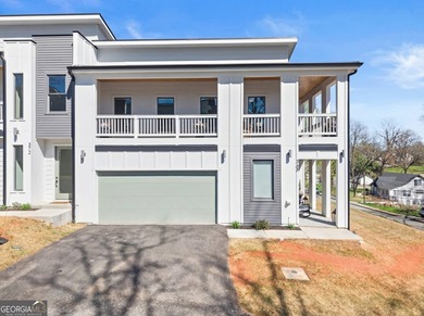 Rare primary-on-main townhome with a two-car garage just steps - photo 4
