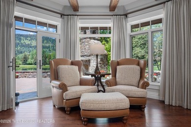 Nestled amid tranquil water features with sweeping views of the - photo 34