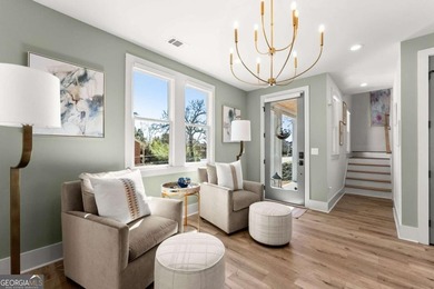 Rare primary-on-main townhome with a two-car garage just steps - photo 7