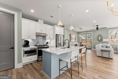 Rare primary-on-main townhome with a two-car garage just steps - photo 8
