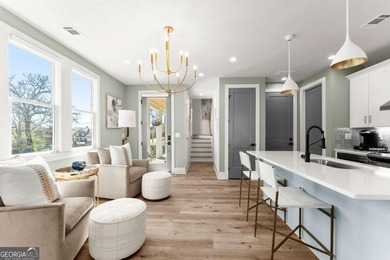 Rare primary-on-main townhome with a two-car garage just steps - photo 10