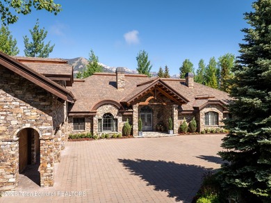 Nestled amid tranquil water features with sweeping views of the - photo 48