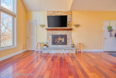 Commanding attention from the moment you enter, this waterfront - photo 11