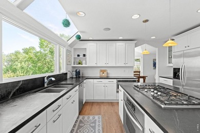 Backing to Lake Valley Golf Club, this beautifully updated - photo 12