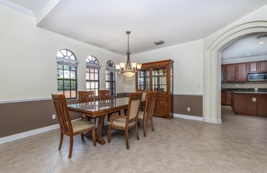This meticulously maintained 4-bed 3-bath residence features a - photo 12