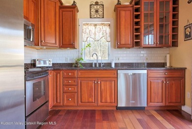 Commanding attention from the moment you enter, this waterfront - photo 12