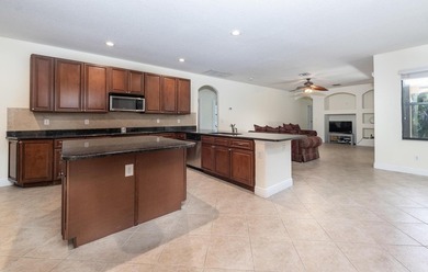 This meticulously maintained 4-bed 3-bath residence features a - photo 13