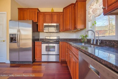 Commanding attention from the moment you enter, this waterfront - photo 13