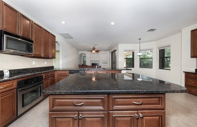 This meticulously maintained 4-bed 3-bath residence features a - photo 14
