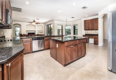 This meticulously maintained 4-bed 3-bath residence features a - photo 16