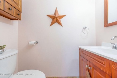 Commanding attention from the moment you enter, this waterfront - photo 17