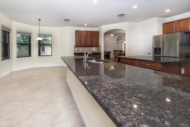 This meticulously maintained 4-bed 3-bath residence features a - photo 21