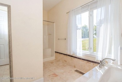 Commanding attention from the moment you enter, this waterfront - photo 21