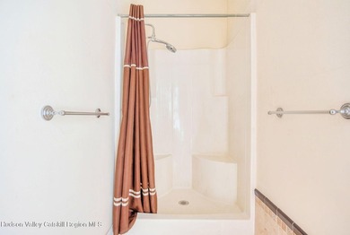 Commanding attention from the moment you enter, this waterfront - photo 22