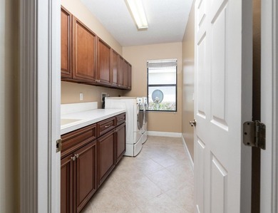 This meticulously maintained 4-bed 3-bath residence features a - photo 31