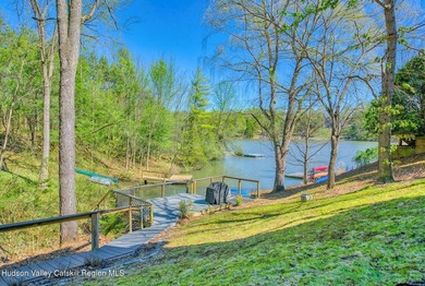 Commanding attention from the moment you enter, this waterfront - photo 49