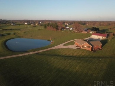 Incredible home on almost 6 acres with a pond in the Ferdinand - Lake Home For Sale in Ferdinand, Indiana