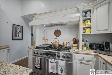 4 bedroom, 4 bath home set on a quiet street with an impressive - photo 11