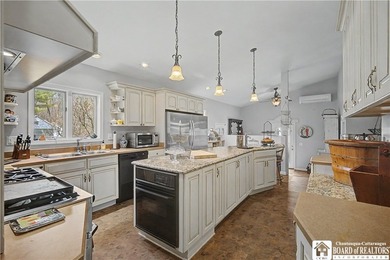 4 bedroom, 4 bath home set on a quiet street with an impressive - photo 12