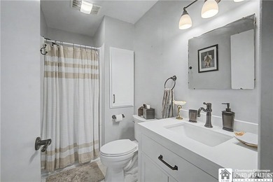 4 bedroom, 4 bath home set on a quiet street with an impressive - photo 19