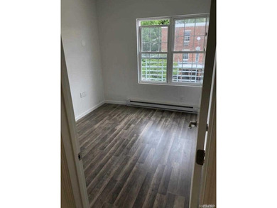 Newly Renovated Detached Two-Family Home in the Heart of - photo 4