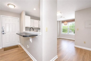 This inviting 2 bedroom, 2 bath condo is located inside the - photo 17