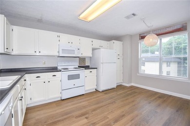 This inviting 2 bedroom, 2 bath condo is located inside the - photo 18