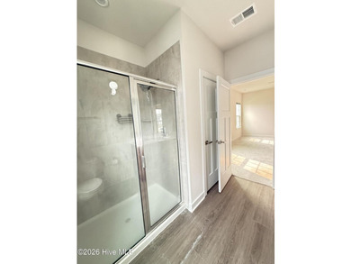 Welcome to effortless coastal living in this like-new 2023-built - photo 31