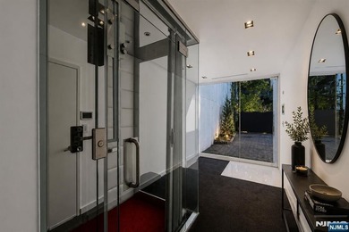 Experience modern luxury in this custom-built contemporary - photo 18
