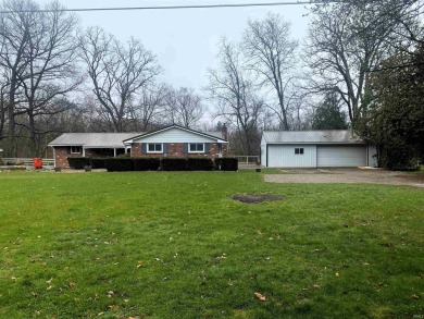 Imagine.... 190' of Tippecanoe River Frontage!!! Fish Year - Lake Home For Sale in Winamac, Indiana