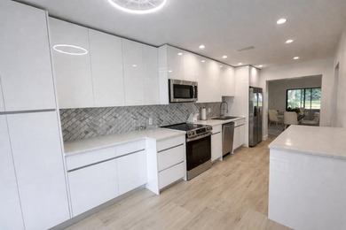 Stunning remodeled modern, spacious, and bright two-story condo - photo 3