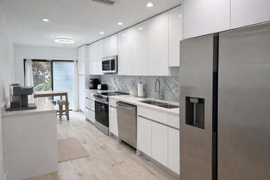 Stunning remodeled modern, spacious, and bright two-story condo - photo 5